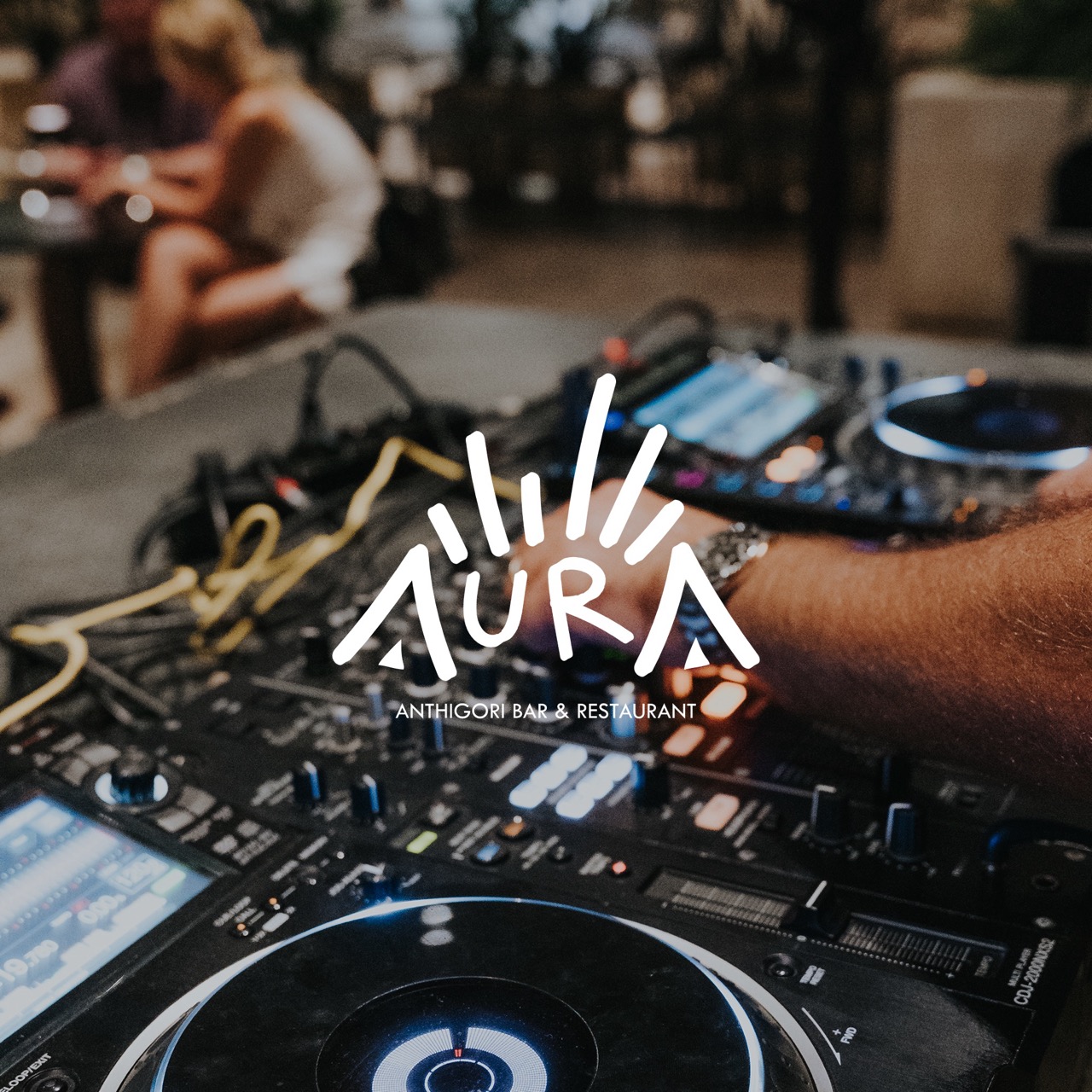 Aura Anthigori Bar & Restaurant DJ mixing setup